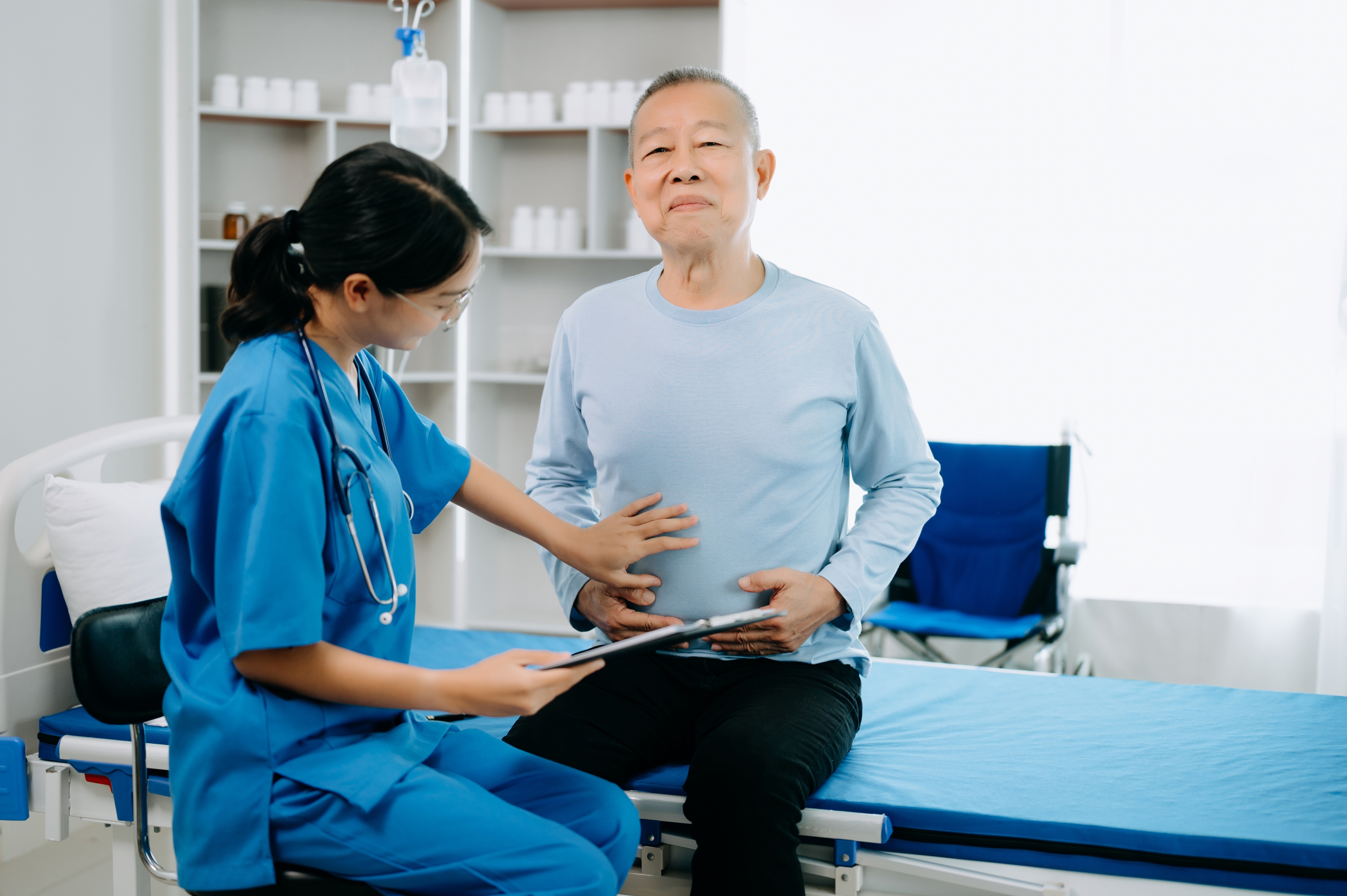 Female doctor holding male patient hand on the bed 2024 01 08 18 38 11 utc