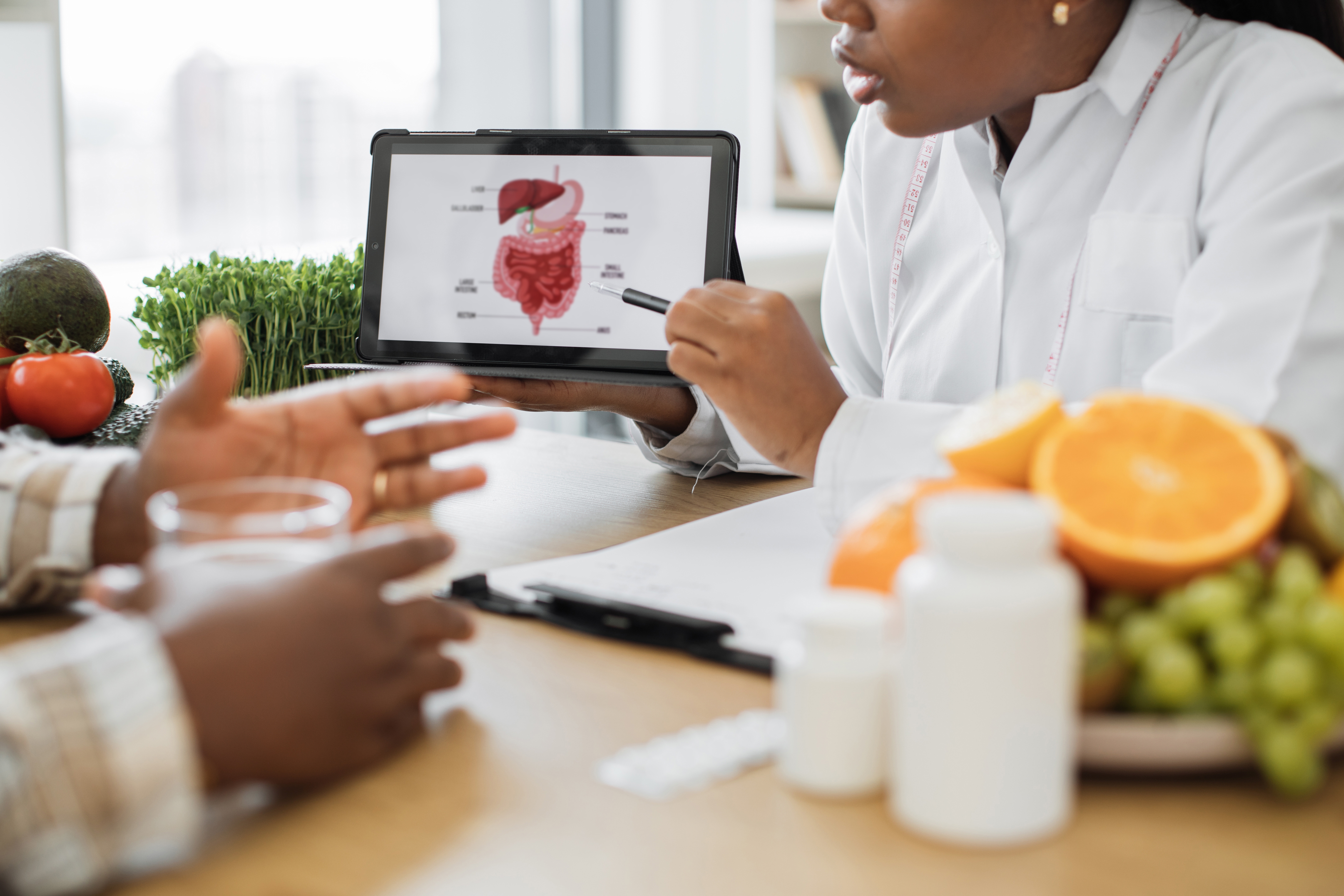 Lady with device analyzing gi treatment with male 2023 11 27 04 59 06 utc